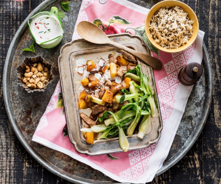 Pork and fresh pineapple stirfry with cashew and coconut dressing