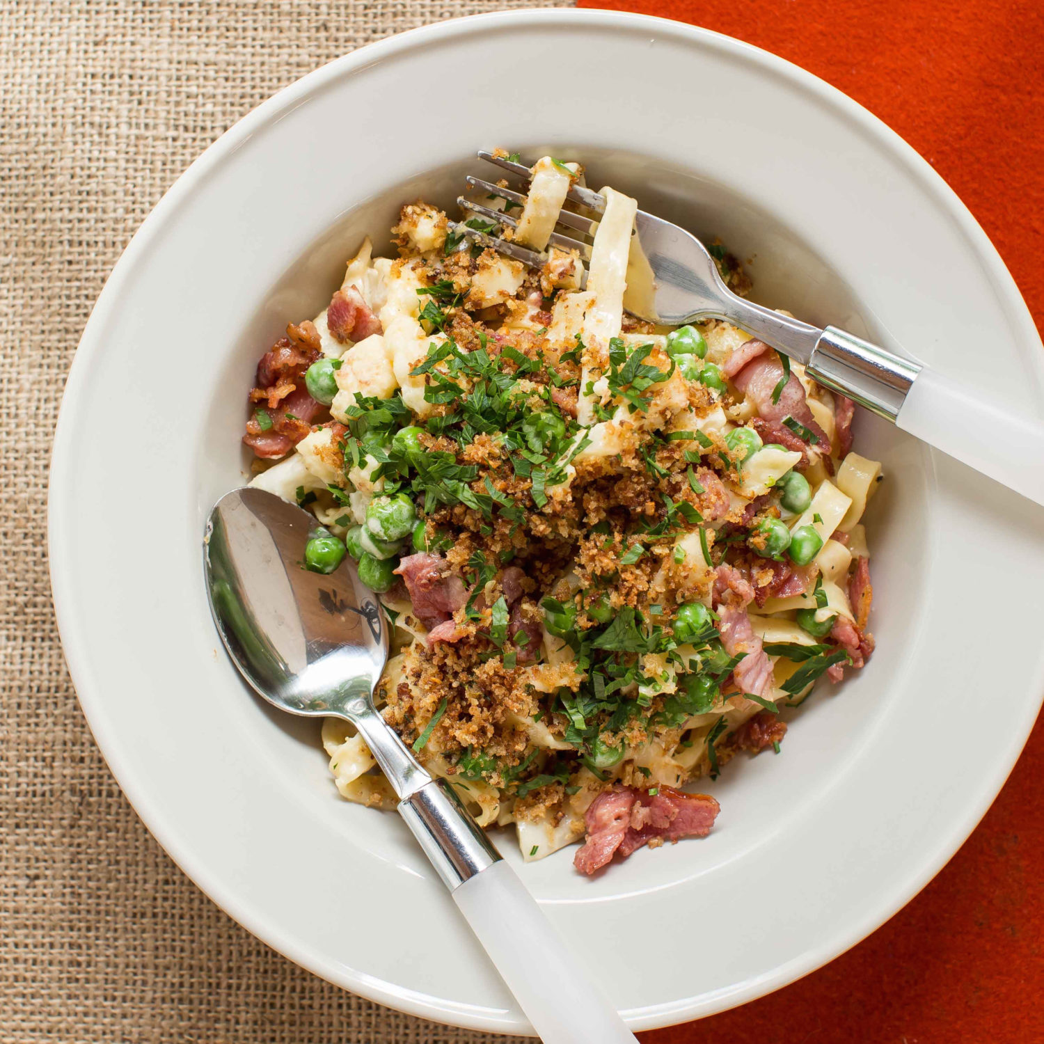 Cauliflower cheese fettuccine with bacon, peas and garlic crumbs-image