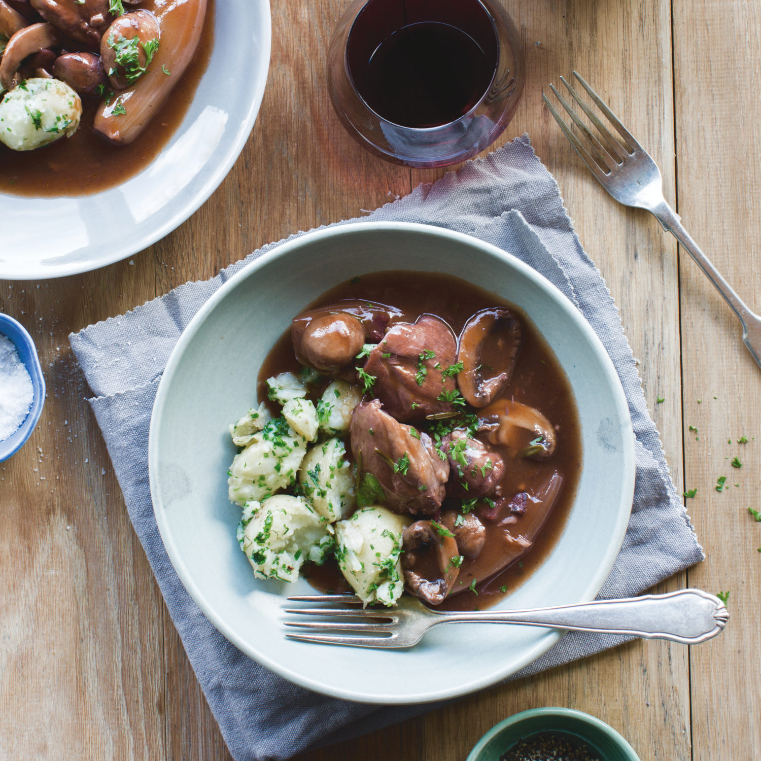 Coq au vin with herb crushed potatoes, brussels sprouts and bacon