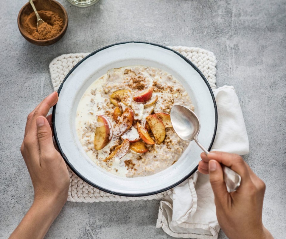 Creamy millet and steelcut oats with caramelised cinnamon apples